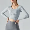 Yoga Tops Long Sleeved T shirt Autumn Winter Cross Pleated Designer Fitness Wear Womens Slim Sports Top Removable Chest Pad