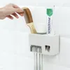 Set di accessori per il bagno Accessori per il bagno Dispenser automatico di dentifricio Crema dentale Supporto per punzonatura gratuito Dentifricio Spremiagrumi