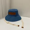 LOO Sombreros Gorras Cloches Diseñador de lujo Sombrilla redonda sombrero de pescador Estilo de tendencia de moda con cordones sombrero de pescador Inglés sombrero de ala grande mujer