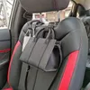 Ganchos trilhos 2/4pcs Carreço do veículo de carro Gancho preto Organizador de armazenamento de cabide universal preto para bolsas de bolsa de bolsa de mercearia