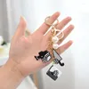 キーチェーンラグジュアリーバッグブラックホワイトウーマンキーチェーンぬいぐるみカーメリアバッグキーチェーンllaveros para mujer chains for women