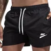 Herren schnelle trocken atmungsaktive Shorts Neue Feste Farben laufende Sporthosen Sommer -Mode -Shorts Brand Logo Druck