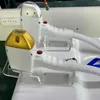 Professionelle 808-nm-Laserdioden-Haarentfernungsmaschine mit zwei Griffen, 2000-W-Enthaarungsausrüstung, dreifache Wellenlängen-Eis-Titan-Gerät