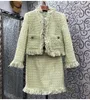 Arbetsklänningar toppkvalitet 2023 Autumn Winter 2 Piece Tweed Wool Set Women Pocket Patchwork Tassel Cardigan Coats Warm Kjol Set