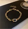 Bracelet en métal baroque avec chaîne en zircons micro incrustés