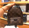 ミニバックパック女性バッグ高品質到着 Pu レザーバックパックバッグレディースバックパックデザイナーバックパックバッグファッションカジュアル女性小さなスタイル M44873