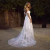 Abiti da sposa a-line bohemien con applicazioni in pizzo e spalle scoperte Abiti da sposa lunghi in tulle Pastrol Beach Abito da sposa estivo Vestido De Novia