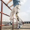 Męskie dżinsy 2023 Hip Hop Joggers Spodnie Cargo Mężczyźni Harem Multi-Pocket Ribbons Man Sweatpants Streetwear Casual Mens S-5xl240h