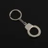 Gesimuleerde handboeien metalen sleutelhanger Persoonlijkheid Simulatie Advertentie Auto Taille Keyring Chain Hange accessoires