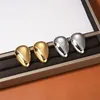 Boucles d'oreilles en métal brillant de goutte d'eau exagérée française Niche Femme Senior 925 Silver Needle Unique Temperament Jewelry Accessores