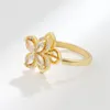 Anéis de casamento moda moda luxo rotativo de quatro folhas de quatro folhas moinho de vento embutido anel de zircão completo personalidade de tendência feminina Luckywedding