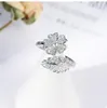 Bagues de cluster Exquis Fleur Feuille Plaque d'argent Blanc Zircon Bague Bijoux 925 Timbre Personnalité Feuille Cristal Tempérament Ouverture