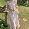 Sukienki swobodne vintage kwiatowe szelki Waczające Długie sukienki Wysokiej jakości wysokiej jakości 2023 Summer Modna Seksowne Backless Holiday