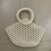 Hand-woven beaded vegetable basket hollowed-out triangular round handle bag Acrylic women's casual handbag 230220