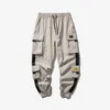 Męskie dżinsy 2023 Hip Hop Joggers Spodnie Cargo Mężczyźni Harem Multi-Pocket Ribbons Man Sweatpants Streetwear Casual Mens S-5xl240h