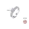 Nowa luksusowa marka cztery Claw Moissanite S925 Srebrny pierścionek biżuteria moda Kobiety pełny diament cyrkon super błyszcząca pierścionek dla kobiet przyjęcie weselne Walentynki Gift SPC
