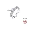 Anello di diamanti Moissanite S925 Sterling Sterling Quattro artigliano anello moissanite Festa a nozze Ring Bride Bride Brand European Women High -End Ring Regalo di San Valentino SPC