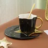 Tasses Saucers Star Moon Golden Handle Coffee Mug et réglé avec cuillère pour le thé de fleur latte cappuccino à la maison