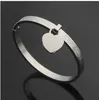 New European and American fashion double-heart titanium steel female bracelet stainless steel rose gold heart-shaped pendant couple bracelet