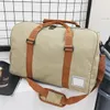 Mode luxe mannen dames canvas reistas duffle tas bagage handtassen nieuwe ontwerpers grote capaciteit buiten sporttassen 272T