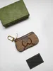 Ny nyckel plånbok pochette liten påse designer mode läppstift väskor kvinnor mens nyckelring kreditkortshållare mynt mynt handväska lyx mini plånböcker charma många färger 671722