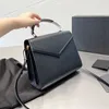 Tasarımcı Cassandra Medium Sap çantası Grain de Poudre kabartmalı deri omuz çantası