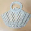 Hand-woven beaded vegetable basket hollowed-out triangular round handle bag Acrylic women's casual handbag 230220