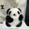 Nyckelringar mini söt panda riktig nyckelring plysch björn leksak barn skolväska hänge kvinnor biltangentning prydnader klassisk födelsedag presentkeychains nyckel