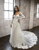 Abito da sposa con applicazioni in pizzo a maniche lunghe A-Line Abiti da sposa Boho Beach Estate 2023 Abiti da sposa country sexy senza schienale Fodera champagne Realizzato su misura