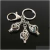 Keychains Lanyards Euro -Amerikaanse pootafdruk Pearl Cage Key Ring kan holle noctilucte vulkanische stenen hanger Keyring druppel delive D3O