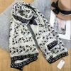 Spring and autumn new European men and women's black and white scarf outdoor travel are very atmospheric