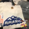 T-shirt da uomo T-shirt da uomo Snow Mountain Human Made T-shirt Uomo Donna T Shirt Tee Tops0221V23