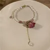 Orecchini pendenti 2023 Design di nicchia vintage Senso Fiore immortale Perla naturale Bracciale d'acqua dolce retrò regolabile
