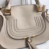 مصمم حقيبة حقيبة Marcie Women Women Big Hand Handbag Leather Shop Pages مصممون حقيبة حمل مزدوجة مصنوعة من حمل العجل الحبيب 7A محفظة كبيرة ذات جودة كبيرة كل الحجم