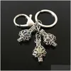 Porte-clés Longes Euroamerican Paw Print Pearl Cage Porte-clés Peut Ouvrir Creux Noctilucent Pierre Volcanique Pendentif Keyring Drop Delive D3O