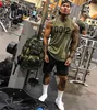 T-shirts pour hommes été hommes musculation débardeurs Gym entraînement Fitness coton chemise sans manches vêtements de course Stringer Singlet gilet décontracté 230220