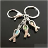 Porte-clés Longes Euroamerican Paw Print Pearl Cage Porte-clés Peut Ouvrir Creux Noctilucent Pierre Volcanique Pendentif Keyring Drop Delive D3O