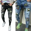 Men's Jeans 2 Styles Men Stretchy Ripped Skinny Biker Embroidery Print Jeans Destroyed Hole Taped Slim Fit Denim Scratched High Quality Jean 022023H 022123H