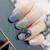Falska naglar söta med 3D Bow -figur och kawaii design för skolflickan manikyr dekoration press på glitter 24 st