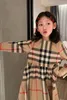 卸売りの子供服の幼児の女の子のドレス子供服格子縞のドレスシルビアcic