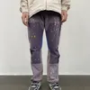 Herr jeans retro hiphop stänk bläck smala jeans nödställda lapptäcke denim jean män high street fashionabla graffiti denim byxor 230220