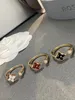 Mode Luxus Damen Ring S925 Silber Gold vierblättriges Kleeblatt Designer Band Ringe für Frau kleine frische einfache Nische Senior Sense Öffnungsring