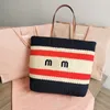 7A Streifen Stroh Einkaufstaschen Frauen Lafite Grass Handtaschen Große Kapazität Hohl-Out Totes Mode Umhängetasche Echtleder Griff Gestickte Buchstaben Strandtasche