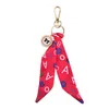 Nyckelringar Fashion Sharves Key Chain Bowknot Utsökta dekoration Silk Tassels Keychains Women Bag Charm Pendant J230222