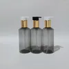 Botellas de almacenamiento 20pc 200ml PET de plástico vacío con bomba de loción de aluminio dorado Contenedor gris para jabón líquido Gel de ducha Embalaje cosmético