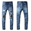 Przyczynowy projektant dżinsów Mężczyźni amirir dżinsy Nowa moda stylista czarny niebieski chude rozryte zniszczone rozciąganie Slim Fit Spodnie 28-40 Najwyższej jakości dżinsy Uomo FD