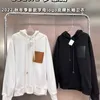 Suéter con capucha de algodón hombres mujeres sudadera con capucha diseñador bolsillo de cuero sudaderas con capucha bordadas sudadera con capucha casual chaqueta abrigo de moda 4xl 5xl