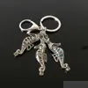 Keychains Lanyards Euramerican Seahorse Pearl Cage Key Ring Can Open Hollow Noctilucent Volcanic Stone Pendant Keyring Drop Delivery Dhieu