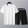 Herr t-shirts Summer Cotton Men's Suit Kort ärm T-shirt 2-stycken Set Sports kostym Kvinnor Fashion Solid Color Tshirt och Shorts Gratis frakt Z0221