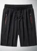 Män s shorts sommar svart mesh sweatshorts män sportkläder andas nylon raka korta byxor plus storlek lös casual gym 8xl 9xl 230221